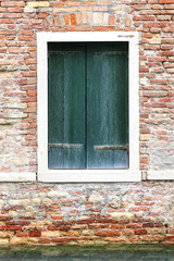 Windows of old house in Venice