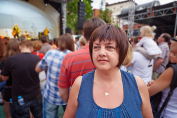 Female visitor of concert of rock-band