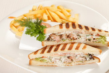 Sandwiches with French fried potatoes