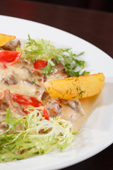 meat with sauce and vegetables