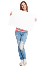Casual young woman holding a white board
