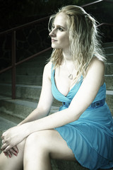 Naklejka premium Blonde lady in blue shirt