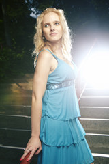 Naklejka premium Nice woman in blue apparel