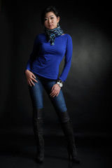 Asian woman in blue shirt