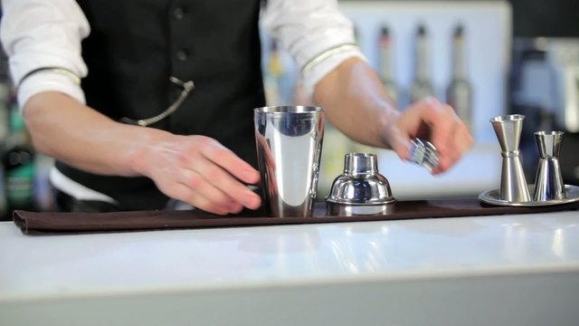 Barman preparing shaker for cocktail preparation