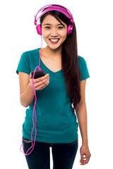 Pretty girl listening to music
