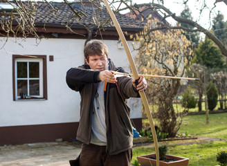 Young archer training with the bow
