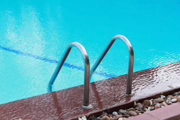 bars ladder in the  pool