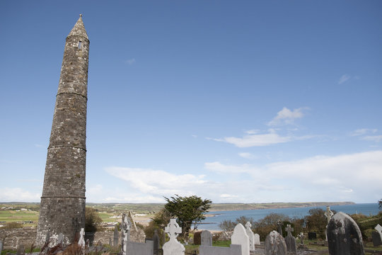 Ancient Irish round tower and celtic graveyard