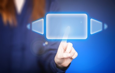 Woman's hand pushing the button on touch screen