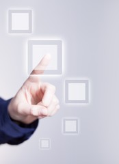 Woman's hand pushing the button on touch screen