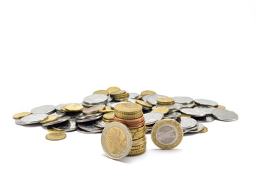 stack of coins near a heap of coins