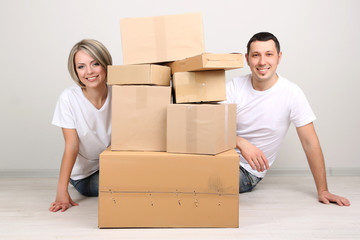 Young couple moving in new house