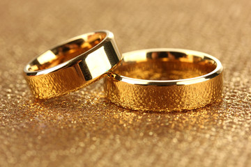 Wedding rings on bright background