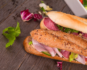 Fresh French healthy baguette on wood 