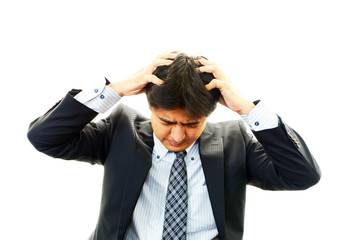 苦悩するビジネスマン