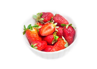 Bowl of strawberries over white