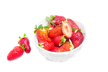 Strawberries over white
