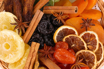 Dried fruits with cinnamon and anise stars close-up