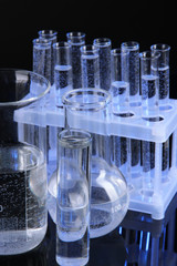 Test tubes on black background