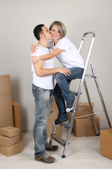 Young couple moving in new house