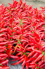 Red chili peppers in market, closeup view