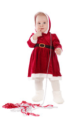 Small girl dressed as Santa, insulation.