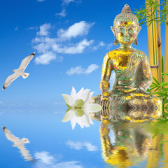 Obraz premium statue de Bouddha au bord de l'eau