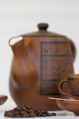 Set de Cafe, tetera, tasas, granos de cafe y azucarera.