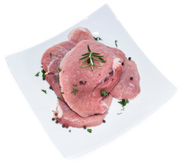 Raw Schnitzel on a plate (white)