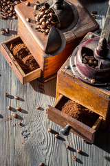 Old coffee grinders with seeds