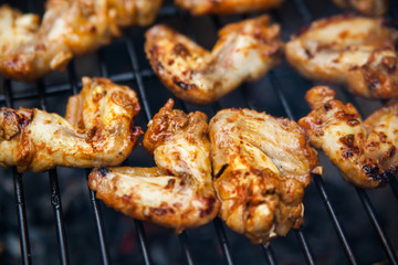 Buffalo wings cooked on grill