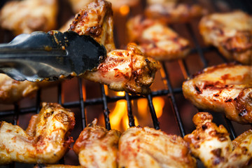 Buffalo wings cooked on grill