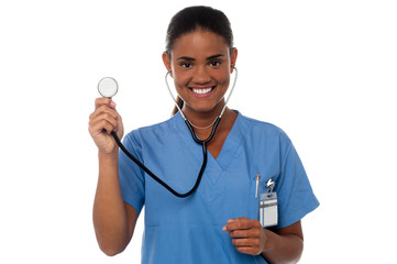 Female physician posing with stethoscope