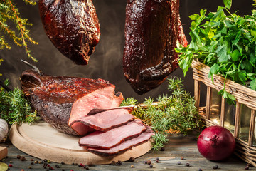 Freshly smoked ham in homemade smokehouse © shaiith