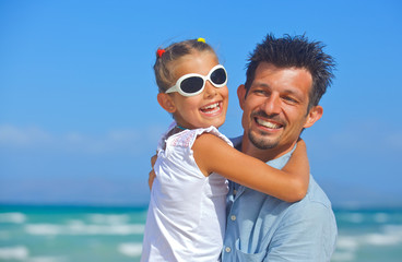 Father with daughter  beach