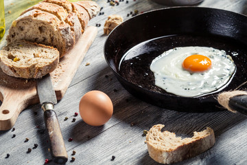 Closeup of homemade bread and fried egg