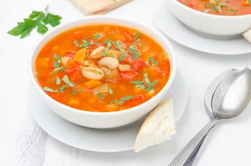 Foto op Plexiglas Vegetable soup with white beans in a bowl top view © cook_inspire