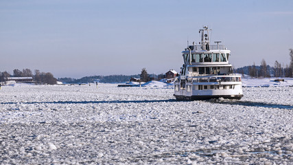 Small ferry at winter