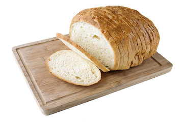 Cutted white bread on the wooden board