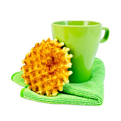Waffles circle with a green mug