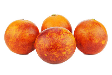 Ripe red blood oranges isolated on white background.