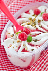 Ice cream with fresh raspberries