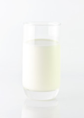 Glass of milk isolated on white
