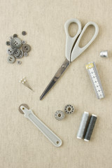 Sewing accessories in grey tones
