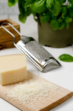 Grated Parmesan cheese with basilica