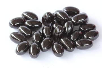 gel vitamin supplements on white