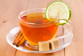 Tea in a glass cup with lime