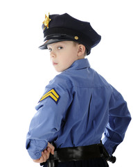Little Cop Looking Over Shoulder