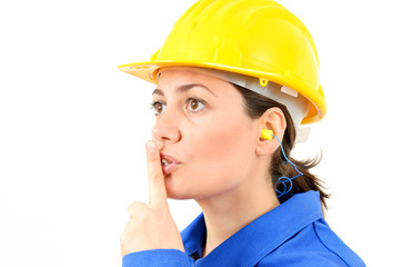 Woman with protective equipment and ear plugs
